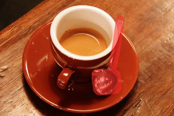 Espresso cup with the spoon painted over in red