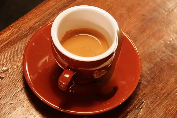 The same espresso cup with the spoon removed